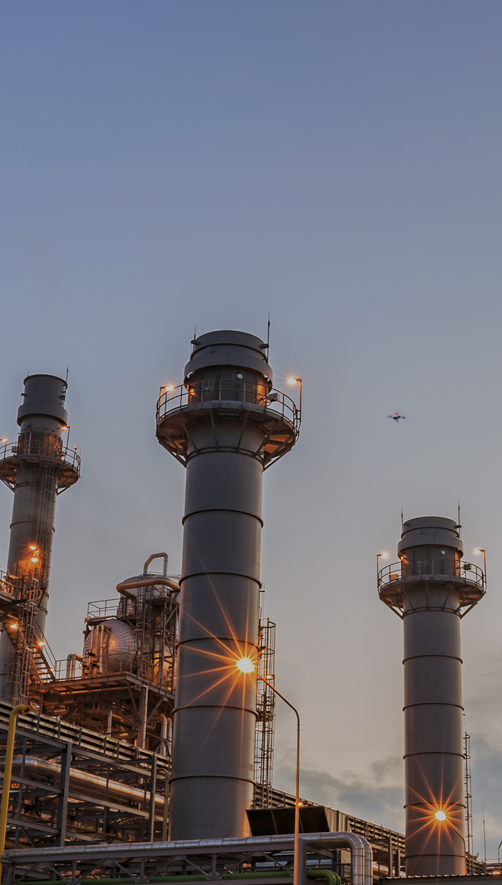 Skydio X10 inspection drone flying near power plant